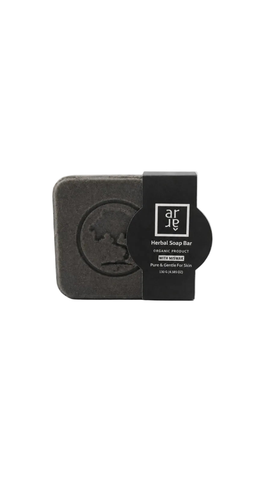 Black soap bar with a label on a white background