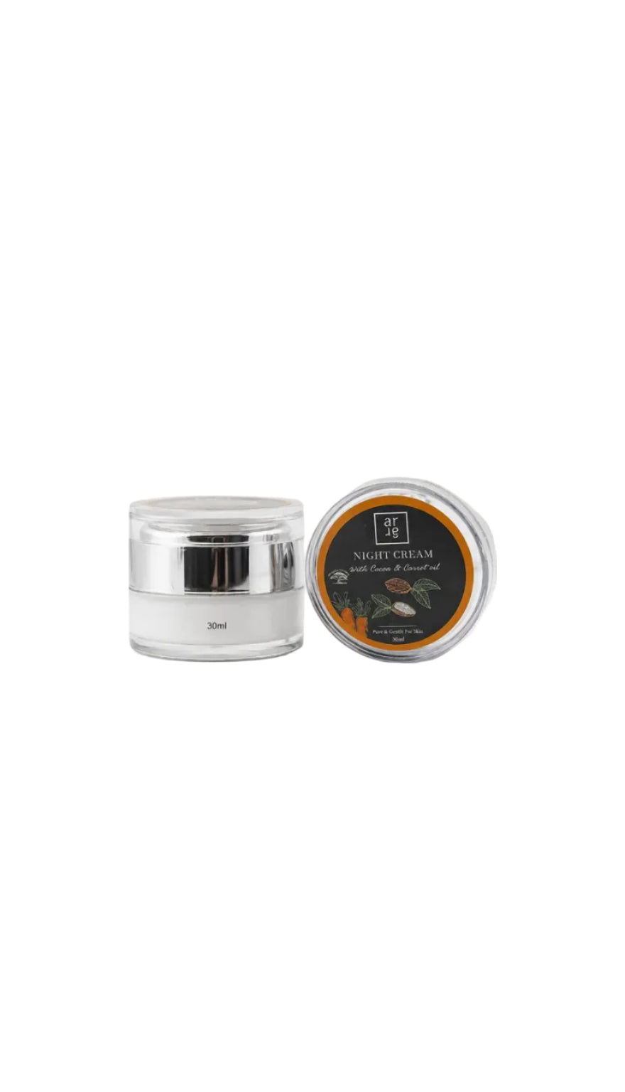 Night cream jar with silver lid on a white background