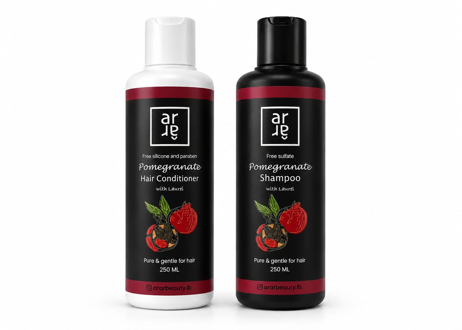 Two bottles of Arde Pomegranate Shampoo and Conditioner on a white background